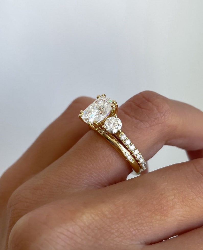 4ct Oval Cut Lab-Grown Diamond Three-Stone Engagement Ring Set in 14K Yellow Gold