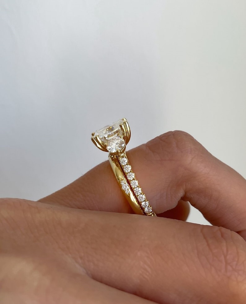 4ct Oval Cut Lab-Grown Diamond Three-Stone Engagement Ring Set in 14K Yellow Gold