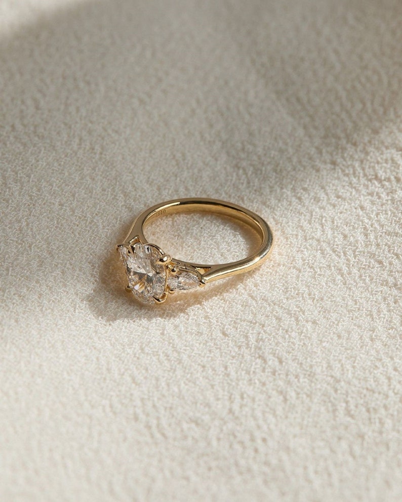 4ctw Elegant Oval Cut Diamond Three-Stone 14k Gold Ring, Side Each Pear Shape Diamond 0.50ct
