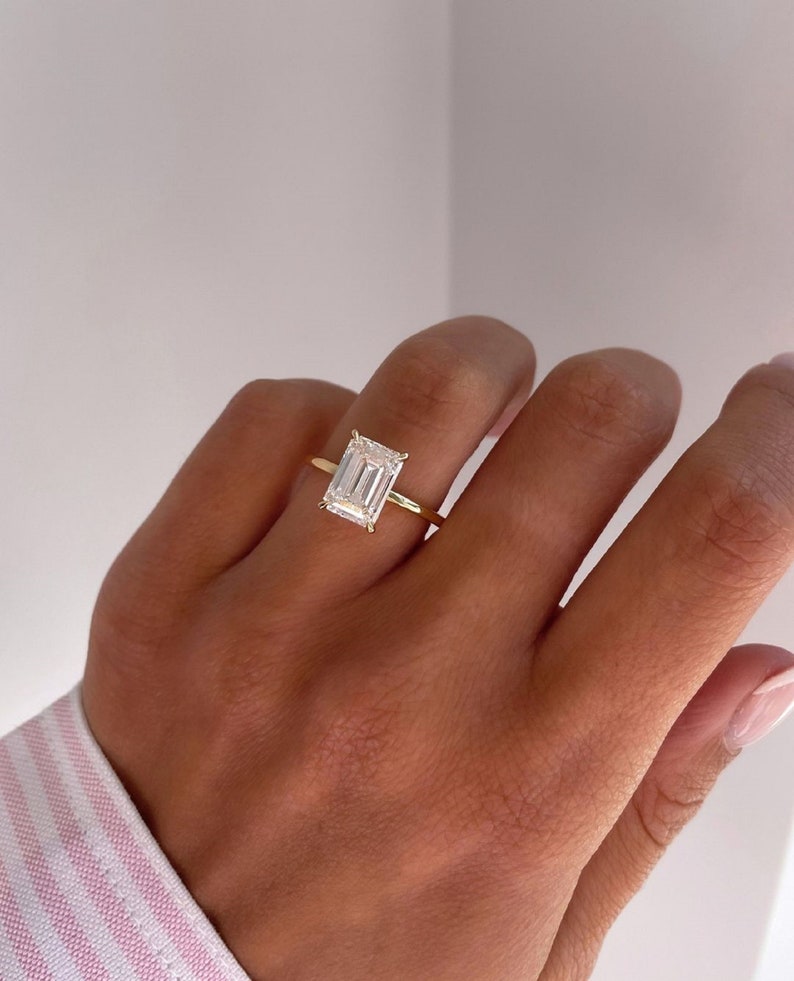 3ct Emerald-Cut Lab Grown Solitaire Diamond Ring in 14k Yellow Gold IGI Certified.