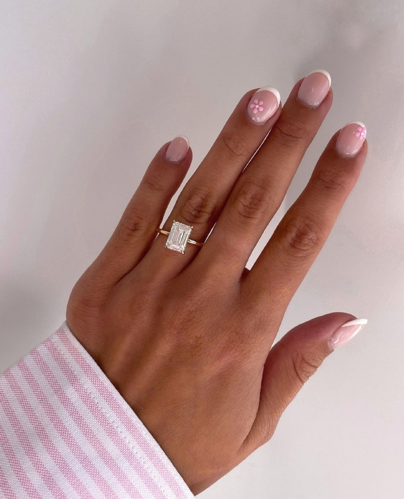 3ct Emerald-Cut Lab Grown Solitaire Diamond Ring in 14k Yellow Gold IGI Certified.