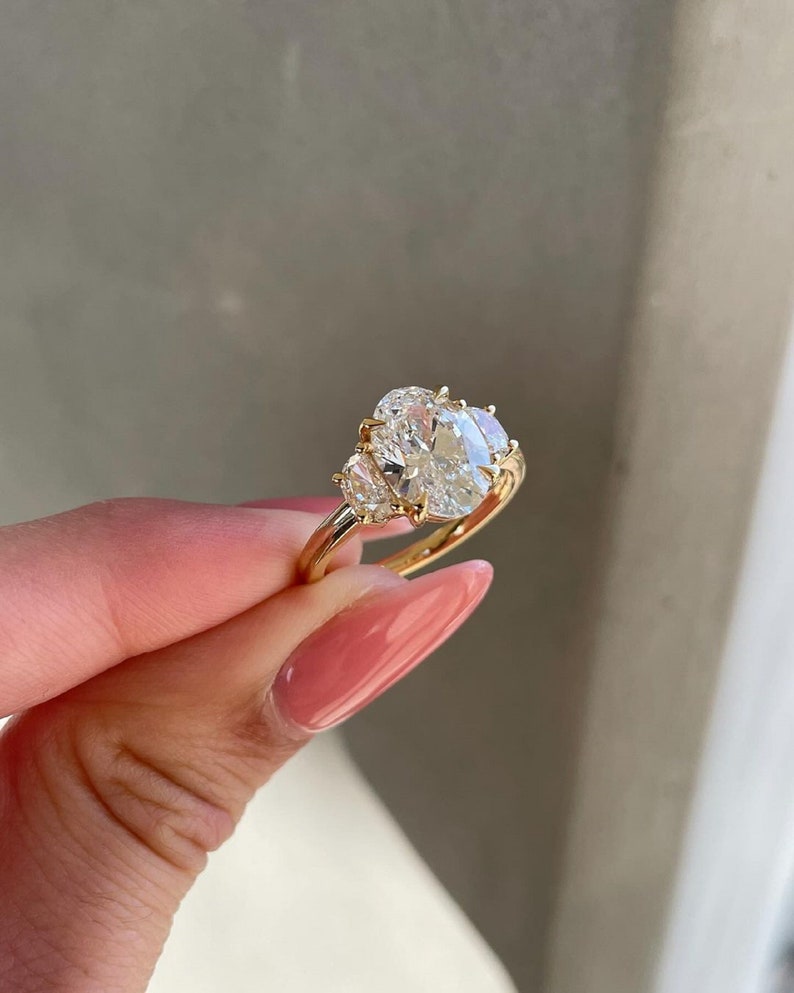 4ctw Oval Lab Grown Trilogy Ring Half Moon Side Stones Each 0.50ct.  14k Gold