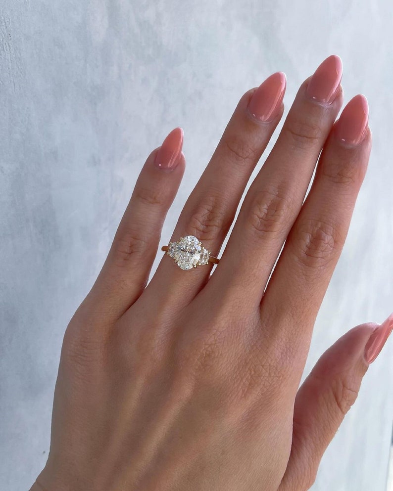 4ctw Oval Lab Grown Trilogy Ring Half Moon Side Stones Each 0.50ct.  14k Gold