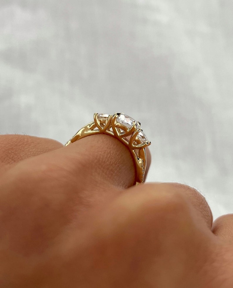 1.50ct 14K Yellow Gold Round Cut Three-Stone Engagement Ring, Side Diamonds 0.25ct Each.