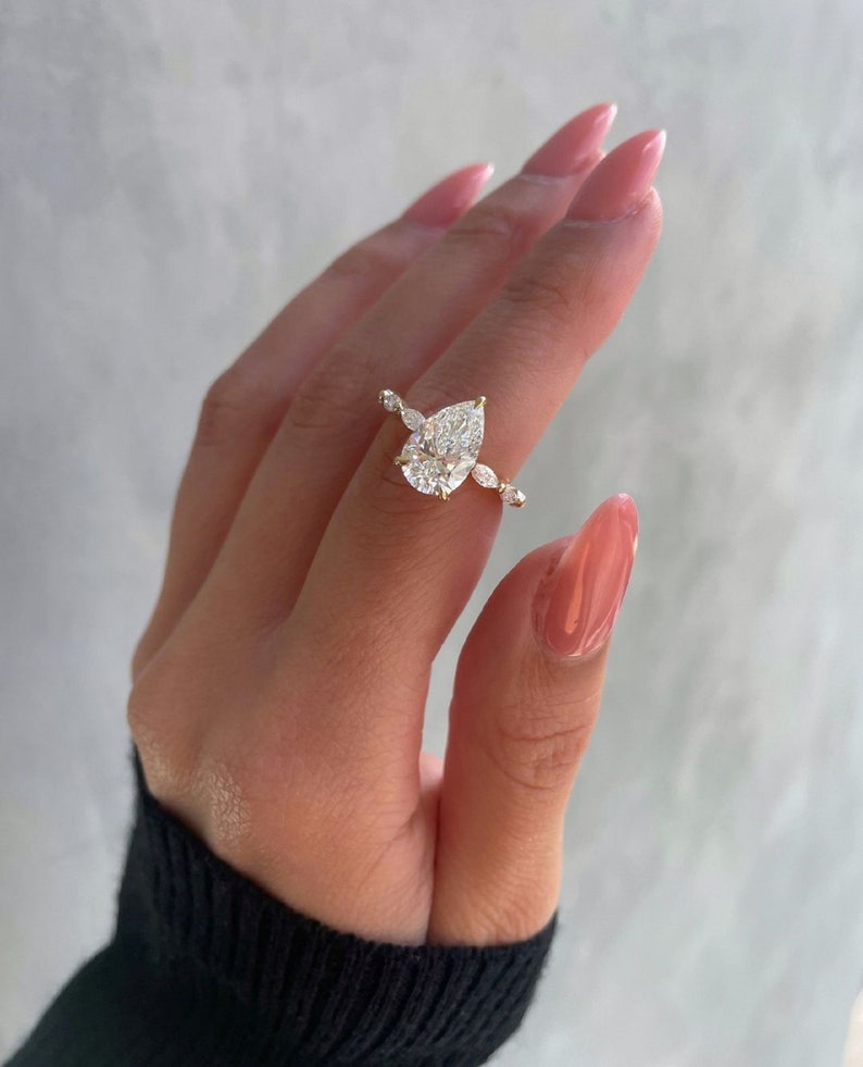 4ct Elegant Pear-Cut Diamond Ring with Delicate Accent Band