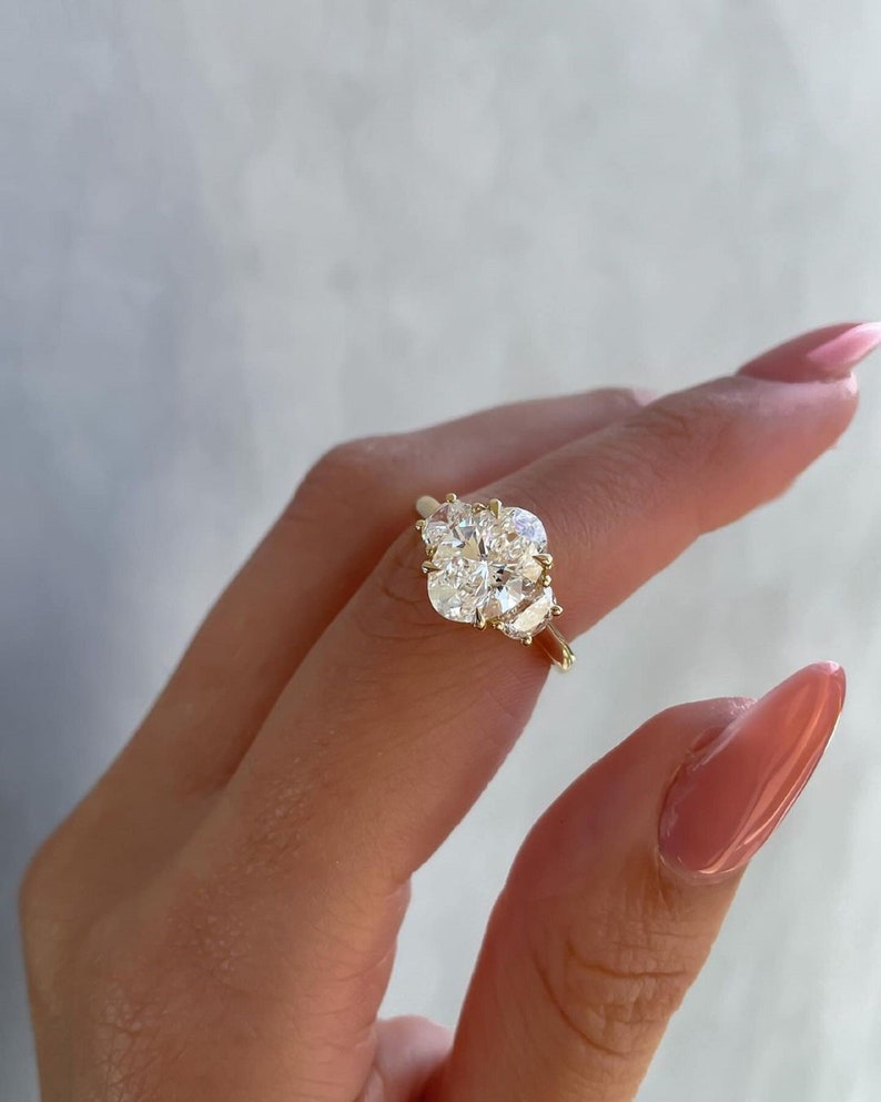 4ctw Oval Lab Grown Trilogy Ring Half Moon Side Stones Each 0.50ct.  14k Gold