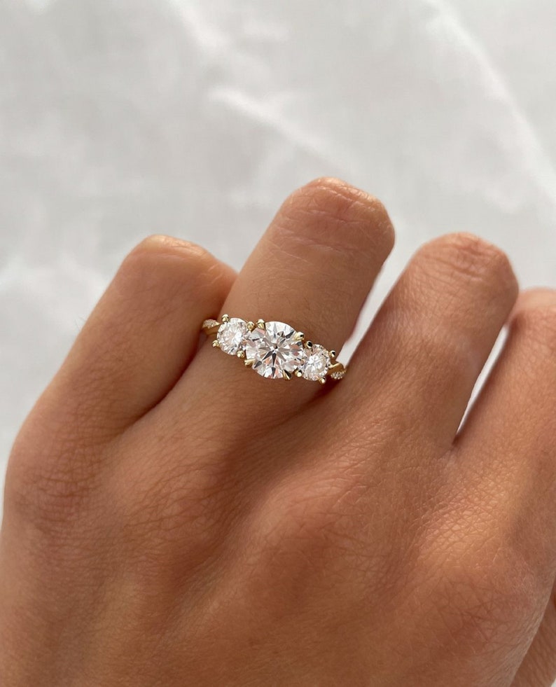 1.50ct 14K Yellow Gold Round Cut Three-Stone Engagement Ring, Side Diamonds 0.25ct Each.